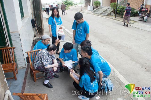 MILE米乐官方网站志愿者探访老街 为灾后修复建言献策